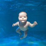 baby swimming underwater | photography by Zena Holloway