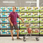 Man grabbing his crotch at grocery store in the paper towel aisle