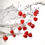 raspberries-splashing-jens-johnson-photography